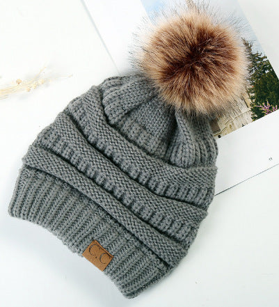 Fleece-Lined Knit Beanie with Pom
