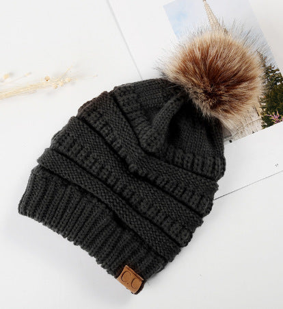 Fleece-Lined Knit Beanie with Pom