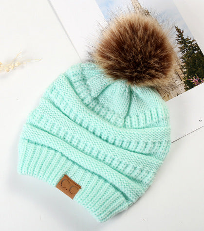 Fleece-Lined Knit Beanie with Pom